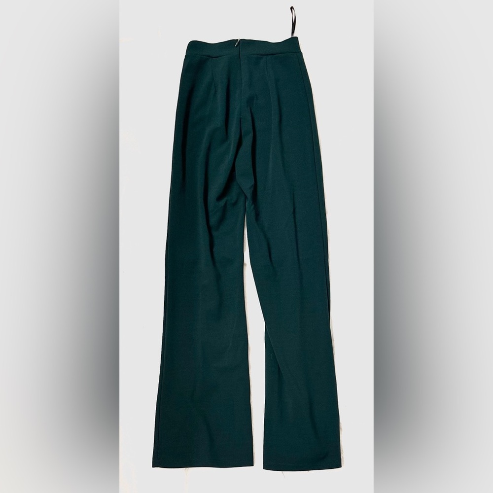 Dark green business slacks with flare bottoms